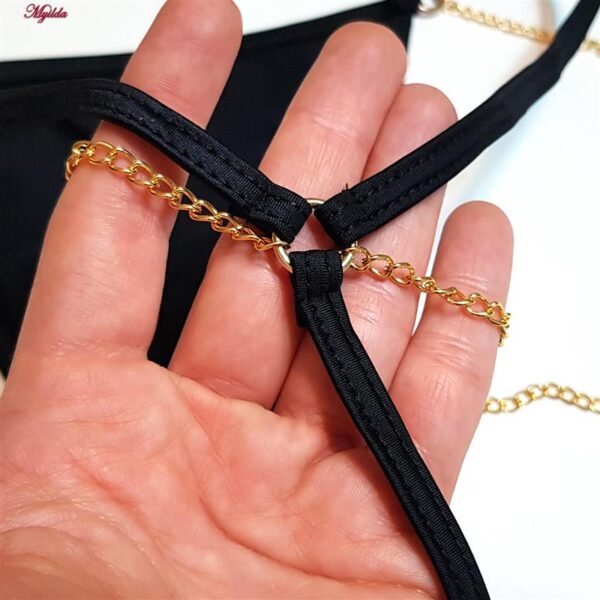 شورت زنانه مدل زنجیردار فانتزی کد ۴۷۶۷-۱۳-۰۱ رنگ مشکی شورت زنانه مدل زنجیردار فانتزی کد 4767-13-01 رنگ مشکی