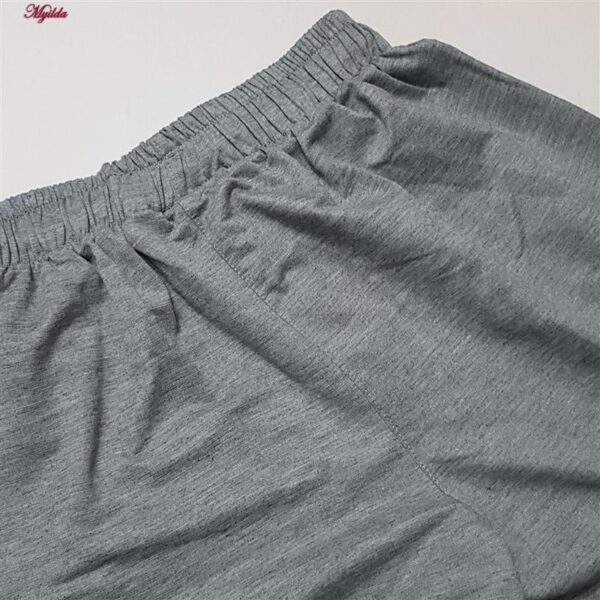 شلوارک مردانه مدل جیبدار کد 5174 رنگ فیلی