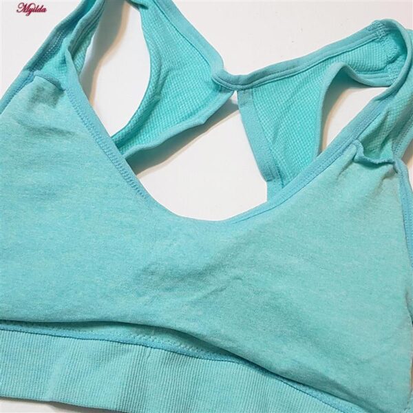 ست نیم تنه و شلوارک ورزشی زنانه ماییلدا مدل سیملس پشت چین دار پددار کد 5172 رنگ سبزآبی