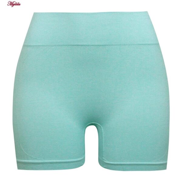 ست نیم تنه و شلوارک ورزشی زنانه ماییلدا مدل سیملس پشت چین دار پددار کد 5172 رنگ سبزآبی