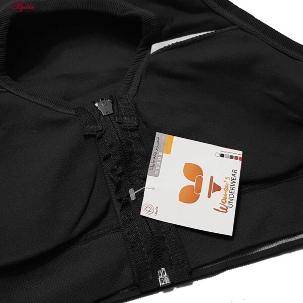 ست نیم تنه و شلوارک ورزشی زنانه ماییلدا مدل زیپ دار پشت چین دار کد 5243-8319 رنگ مشکی