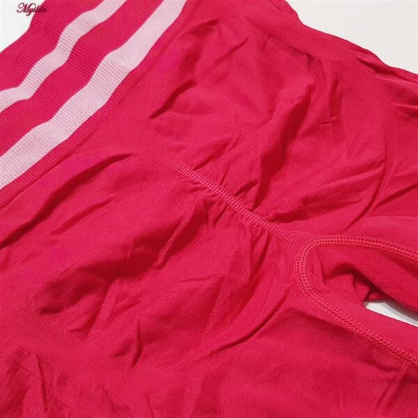 ست نیم تنه و شلوارک ورزشی زنانه ماییلدا مدل زیپ دار پشت چین دار کد 5243-8319 رنگ سرخابی