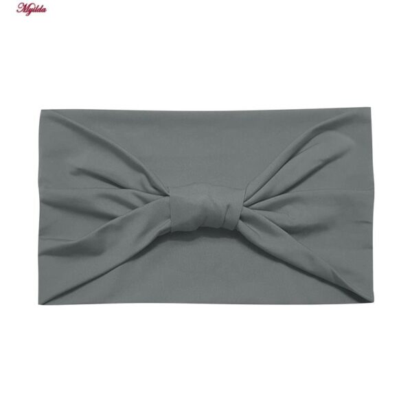 ست تاپ و شلوارک ورزشی زنانه مدل 5215-746P-1 رنگ طوسی به همراه هدبند