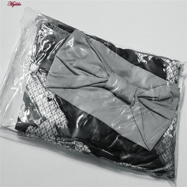 ست تاپ و شلوارک ورزشی زنانه مدل 5215-746P-1 رنگ طوسی به همراه هدبند