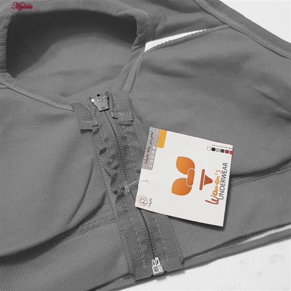 ست نیم تنه و شلوارک ورزشی زنانه ماییلدا مدل زیپ دار پشت چین دار کد 5243-8319 رنگ طوسی