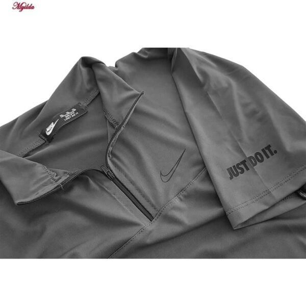 تی شرت آستین کوتاه ورزشی زنانه مدل یقه زیپدار کد 5214-493 رنگ خاکستری