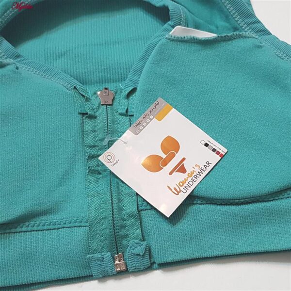 ست نیم تنه و شلوارک ورزشی زنانه ماییلدا مدل زیپ دار پشت چین دار کد 5243-8319 رنگ سبزآبی