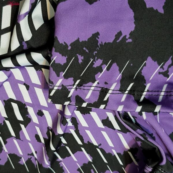 ست گرمکن و شلوار ورزشی زنانه مدل یقه زیپدار کد 5220-703 رنگ بنفش