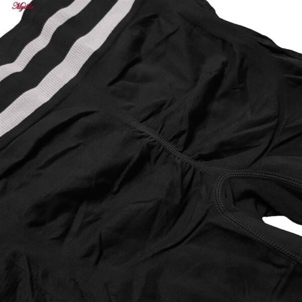 ست نیم تنه و شلوارک ورزشی زنانه ماییلدا مدل زیپ دار پشت چین دار کد 5243-8319 رنگ مشکی