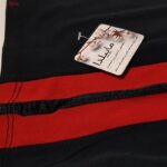 شلوار ورزشی زنانه ماییلدا مدل دمپا گشاد کمرکشی بغل خط دار کد 4705-375 رنگ مشکی