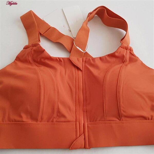 نیم تنه ورزشی زنانه ملییلدا مدل جلو زیپدار پد ثابت کد 5018 رنگ نارنجی