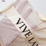 کراپ‌تاپ زنانه مدل لیزری پشت توری کد 5254-5502 رنگ لیمویی