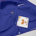 ست نیم تنه و شلوارک ورزشی زنانه ماییلدا مدل زیپ دار پشت چین دار کد 5243-8319 رنگ آبی